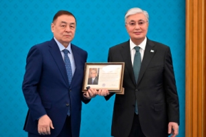 President of Kazakhstan Awards Founder of Alageum Electric Group Saidulla Kozhabaev with the "Altyn Barys" Badge